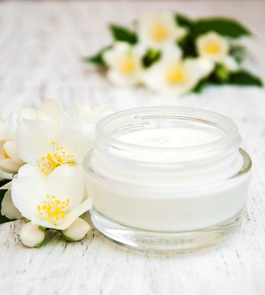 face and body cream moisturizers with jasmine flowers - Photo, Image
