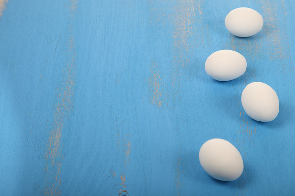 Eggs on a wooden background - Zdjęcie, obraz