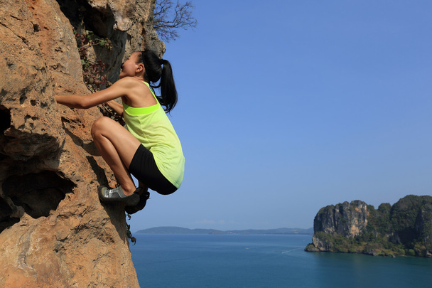 woman rock climber at rock - Photo, Image