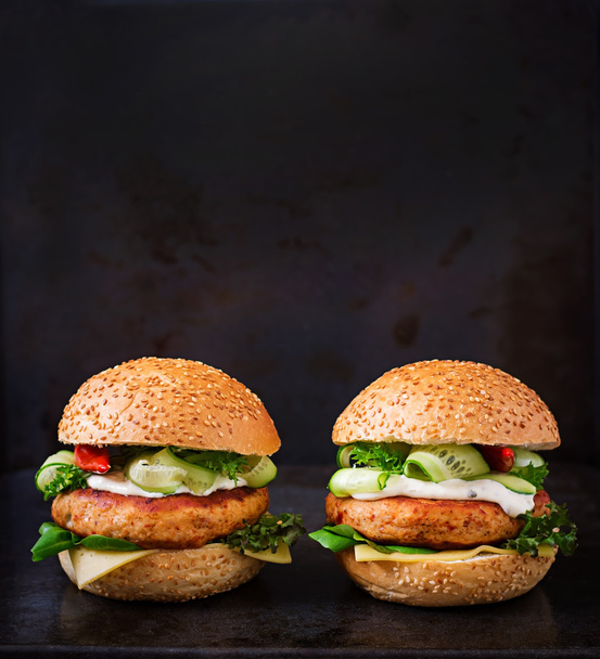 Big sandwiches with chicken burgers - Фото, изображение