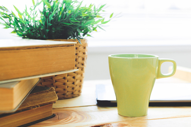 books, cup and plant - Foto, Imagen