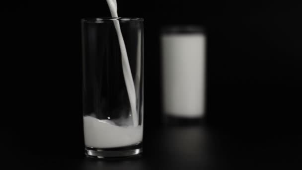 Milk pouring into glass - Footage, Video
