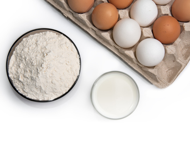 Eggs, glass of milk and flour - Fotó, kép