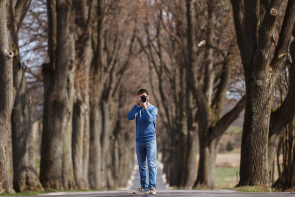 Photographer at work on the road - Photo, Image