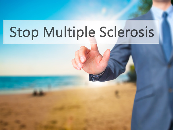 Állítsa le a sclerosis multiplex - üzletember kézzel nyomógomb - Fotó, kép