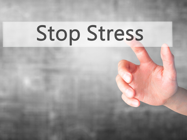 Stop Stress - Mano premendo un pulsante su sfondo sfocato conce
 - Foto, immagini