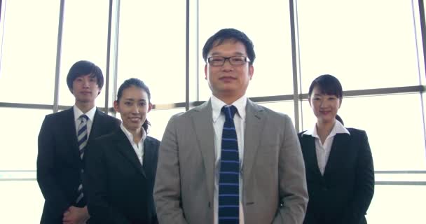Üzleti csapat csoport sikert jelent főnök állandó vezető pozícióban.  - Felvétel, videó