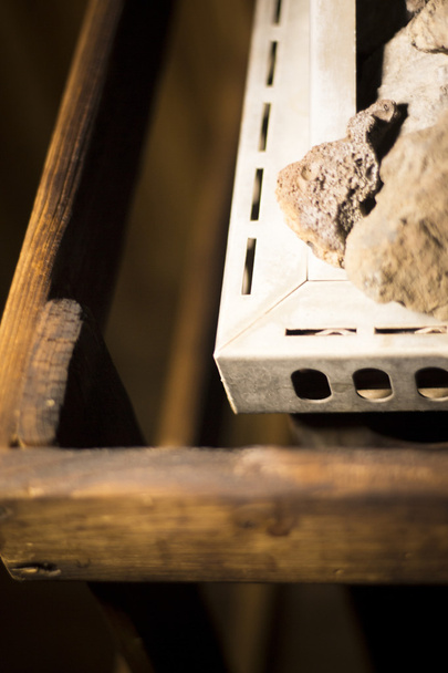 Дерев'яна сауна нагрівач каменів
 - Фото, зображення