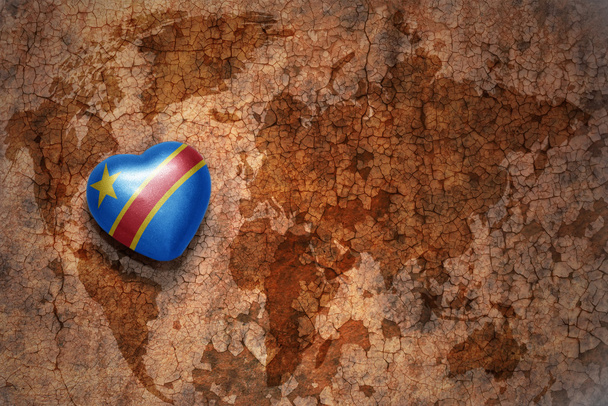 heart with national flag of democratic republic of the congo on a vintage world map crack paper background.  - Photo, Image