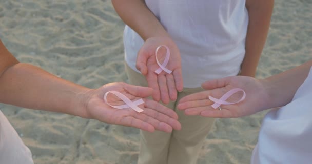 Three women with pink awareness ribbons - Footage, Video