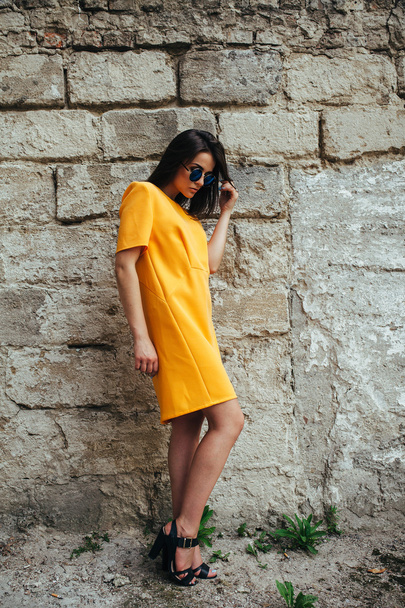Attractive fashion woman in yellow dress - Photo, Image
