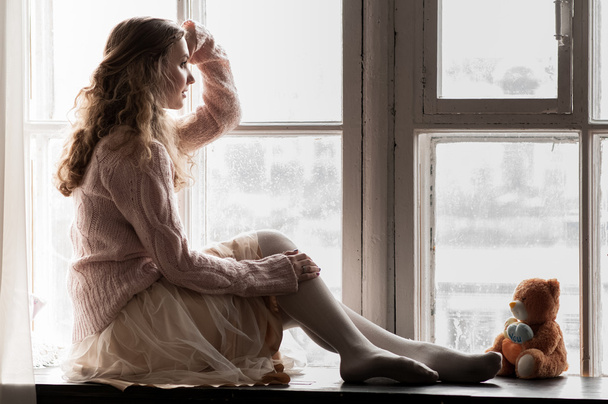 girl in pink by the window - Fotoğraf, Görsel