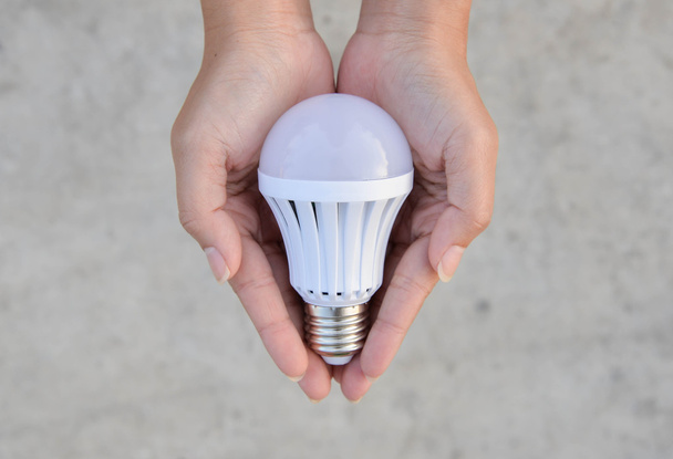 LED Bulb - saving technology in our hand - Foto, immagini