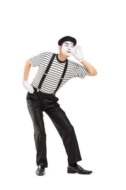 Male mime artist trying to hear something  - Fotoğraf, Görsel