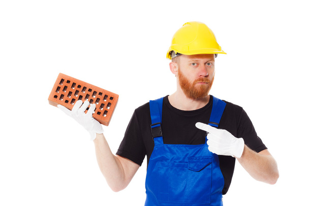 Man builder in the uniform, isolated - Photo, Image