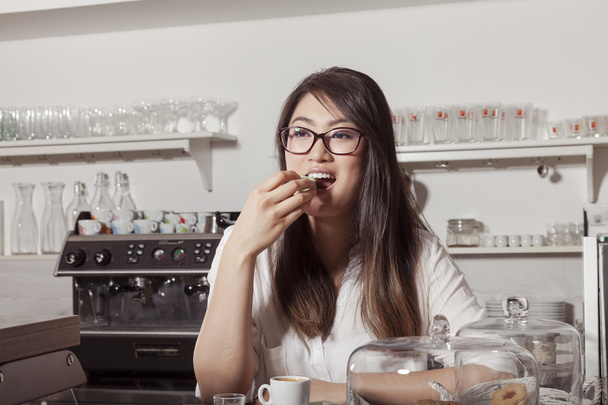 Asian woman with french macaroon - 写真・画像