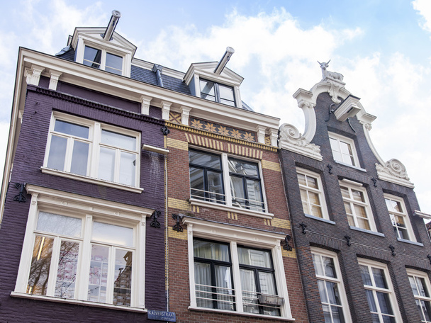 AMSTERDAM, NETHERLANDS on MARCH 27, 2016. Typical architectural details of houses XVII-XVIII of construction - Φωτογραφία, εικόνα