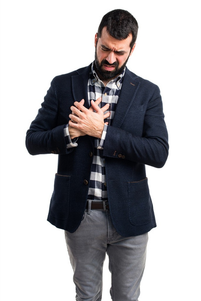 Man with heart pain - Foto, afbeelding