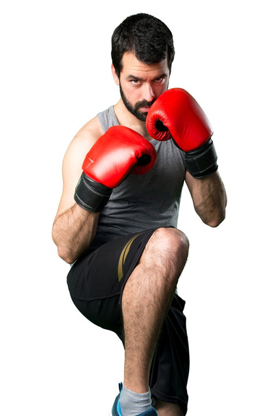 Sportman with boxing gloves - Foto, imagen