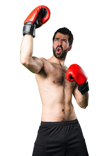 Sportman with boxing gloves - Фото, изображение
