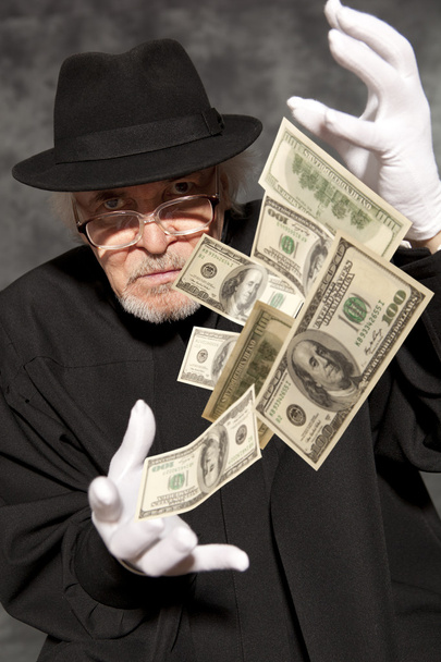 Magician show with dollars banknote - Фото, изображение