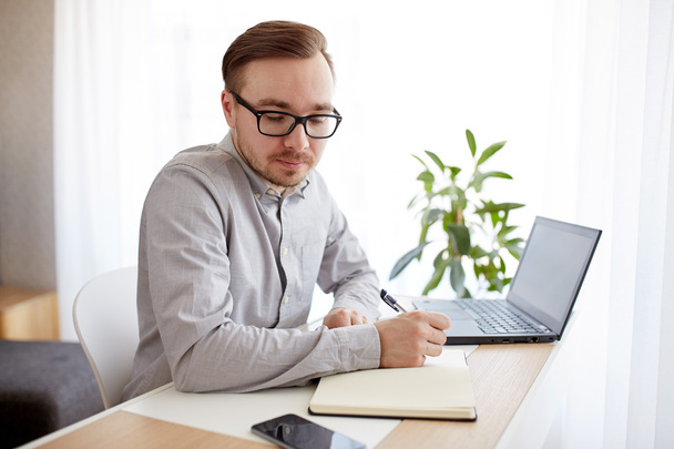 creative man or businessman writing to notebook - Фото, изображение