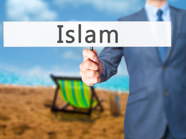 Islam - Empresario mano sosteniendo el cartel
 - Foto, imagen
