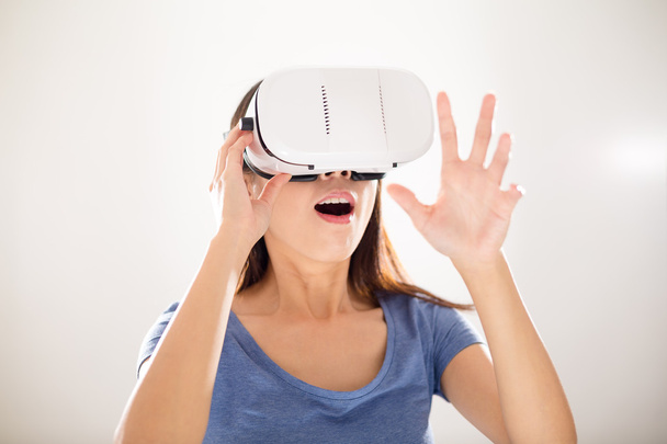 woman using visual reality device - Photo, Image