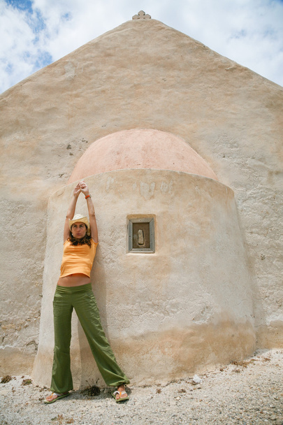 woman leaning on hermitage in Crete - Photo, Image