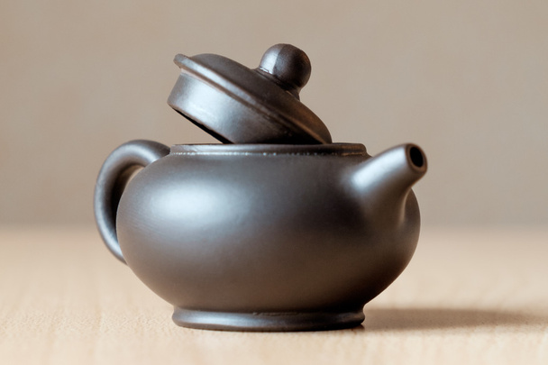 Brown ceramic teapot - Фото, зображення