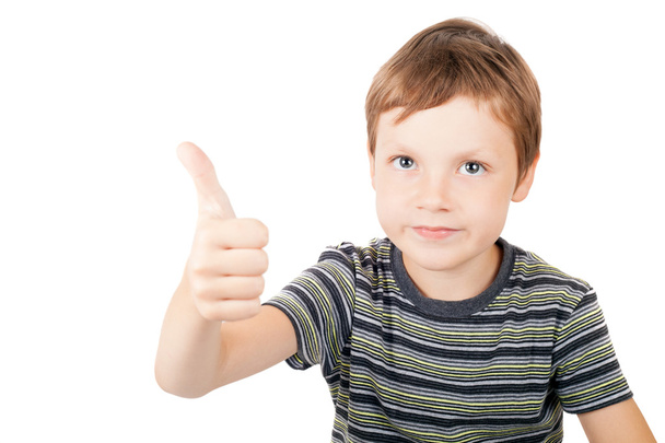 Boy holding his thumbs up - Photo, image