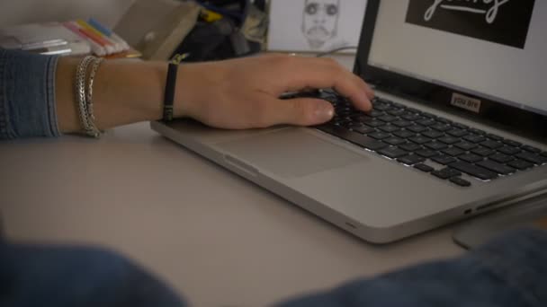 Close up of graphic artist hands using a tablet for his art work dolly shot. - Video