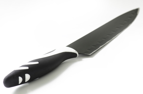 Czarny nóż z twardego tworzywa sztucznego ramię na białym tle - Zdjęcie, obraz