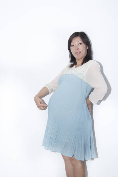 Heureuse jeune femme enceinte chinoise
 - Photo, image