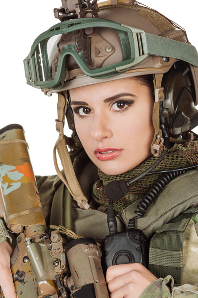 beautiful young girl soldier with weapon posing against white background  - Φωτογραφία, εικόνα