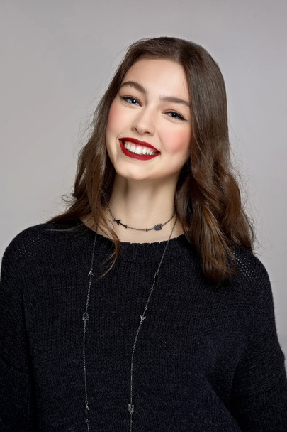 beautiful model with perfect skin and mat red lips - Фото, зображення