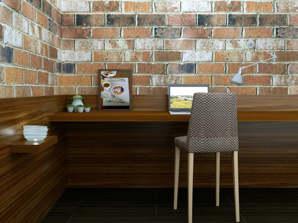 Lieu de travail moderne confortable avec table murale en brique, PC, chaise et décor
 - Photo, image