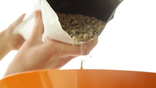 Roasting green coffee in roaster machine - Footage, Video