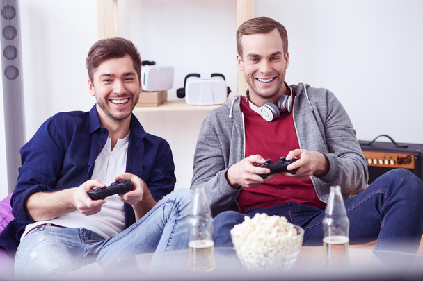 Handsome two guys are playing video game - Fotoğraf, Görsel