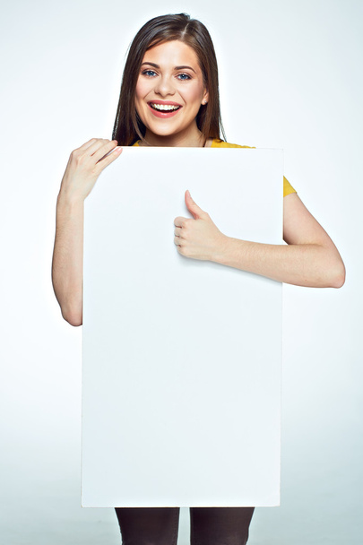 Woman holding white advertising board - Фото, зображення