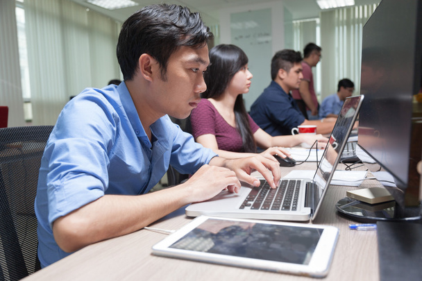 Asian Businessman Sitting At Desk Working Laptop Computer Busine - Фото, изображение