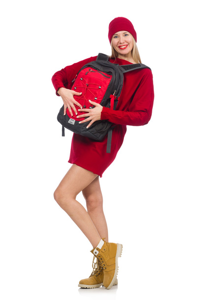 Pretty girl in red dress and backpack isolated on white - Foto, Bild
