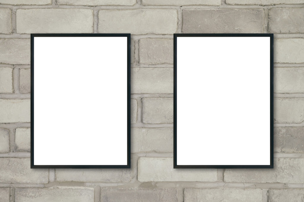 Mock up blank poster picture frame on brick wall. - Photo, Image