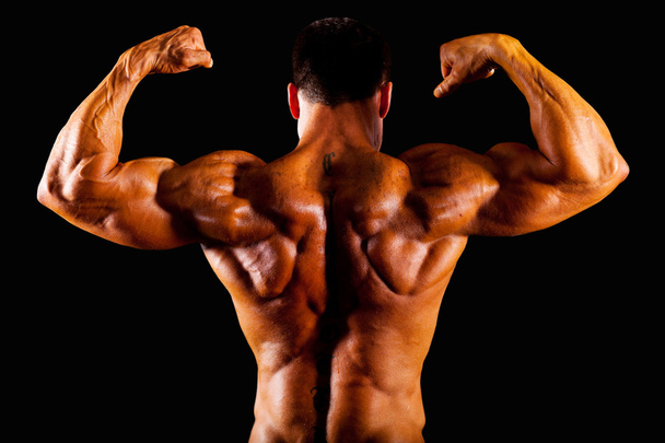 Rear view of bodybuilder - Foto, Imagen