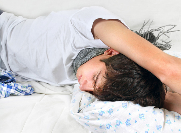 Jeune homme malade qui dort
 - Photo, image