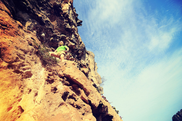  Nainen kalliokiipeilijä
 - Valokuva, kuva