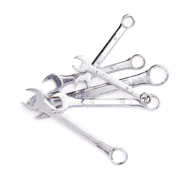 Pile of wrenchs metal instruments isolated over white background - Foto, afbeelding