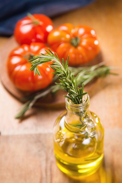 tomatoes with rosemary - Foto, imagen