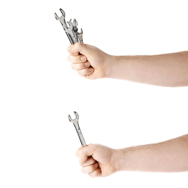 Set of hand holding a wrench tools, composition isolated over the white background - Fotografie, Obrázek