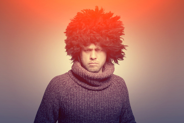 man in fur hat  - Фото, изображение